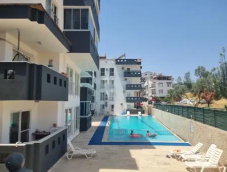 Didim Efeler Mahallesinde Havuzlu Site İçerisinde Satılık 1+1 Ön Cephe Daire